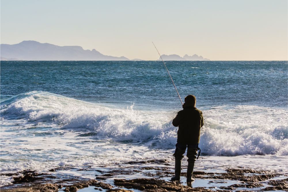 What Is Light Line Surf Fishing 2 Fisherman on the shores of the Mediterranean Sea