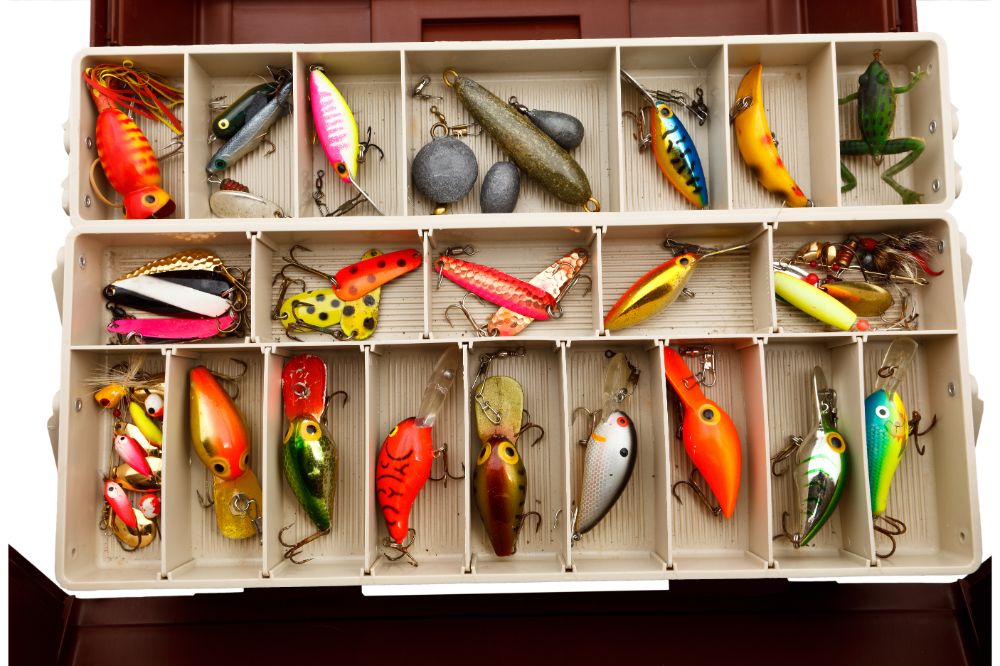 Fisherman's colourful lures in a old tackle box