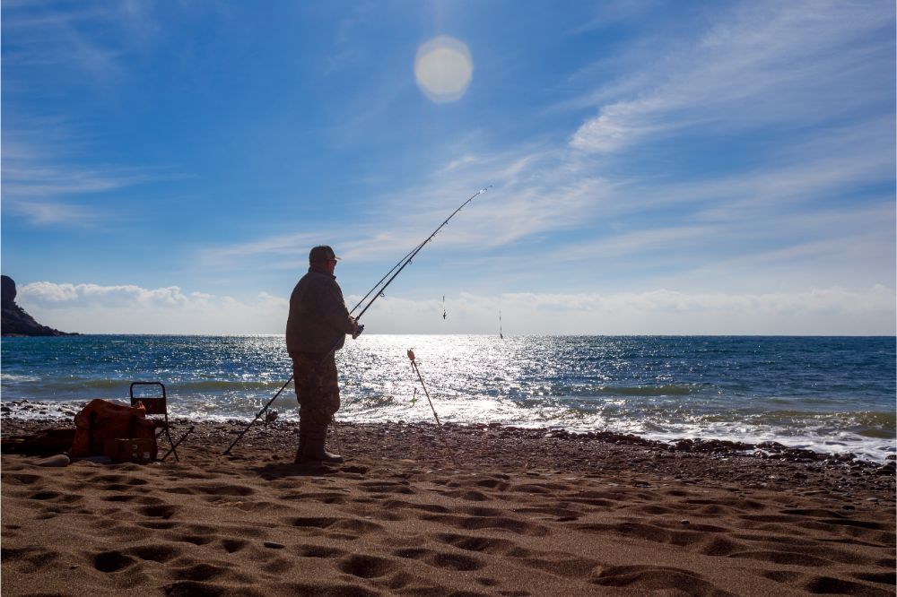 fisherman on the sea with a fishing rod